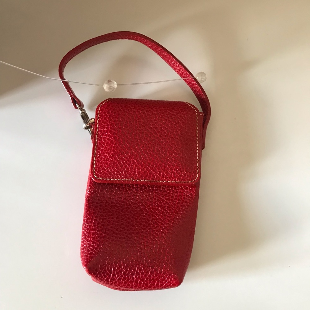 Tusk leather red mini bag .